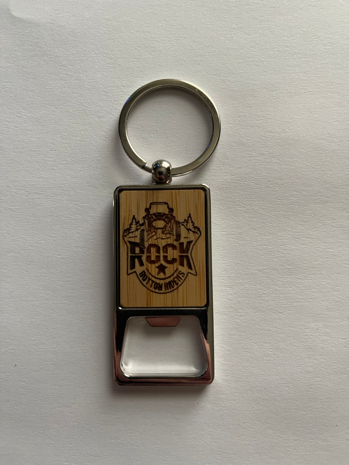 Laser etched key chain with bottle opener.