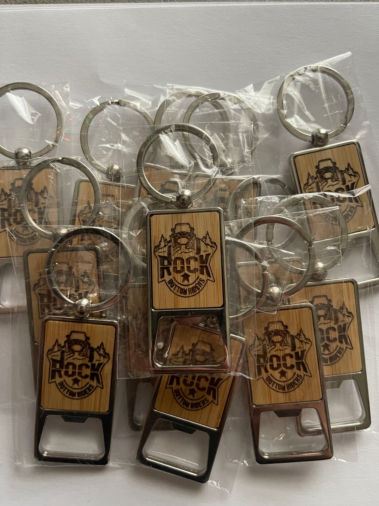 Laser etched key chain with bottle opener.